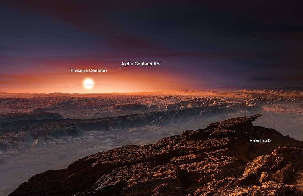 À quoi ressemble la surface de Proxima b ? Il y a de grandes chances pour que la planète soit rocheuse. Vue de sa surface, son étoile Proxima Centauri apparaîtrait trois fois plus grande dans le ciel que le Soleil vu de la Terre. Plus loin, deux étoiles sont visibles : Alpha Centauri A et B. © ESO, M. Kornmesser